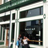 2 students in front of coffee shop